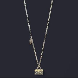 Gold tone necklace with upcycled charms